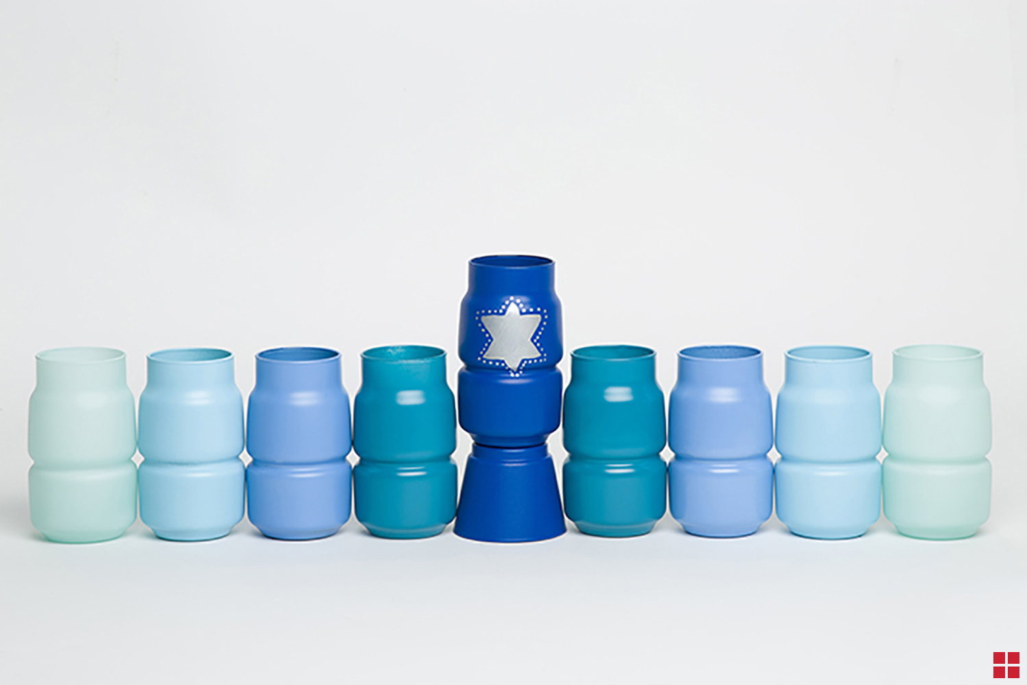 Menorah made from painted glass jars.