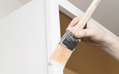 Coat paint with brush